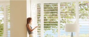Palm Beach™ Polystatin™ Vinyl Shutters with PowerView® Automation